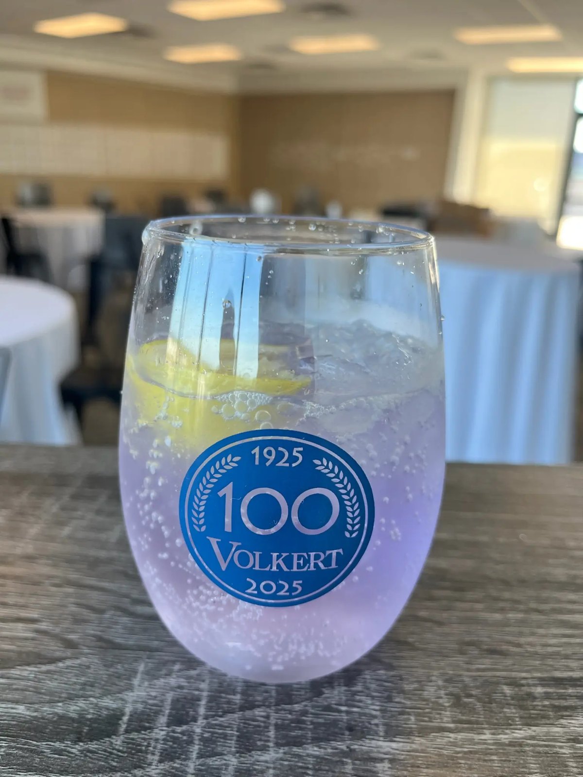 A branded 100th-anniversary cocktail glass